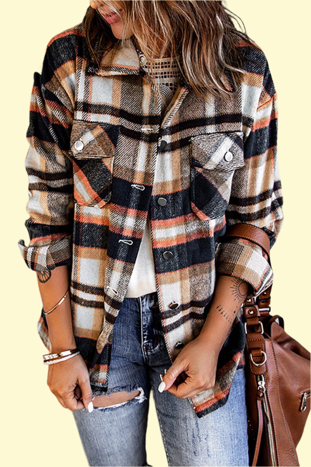 Model wearing a khaki plaid shirt jacket