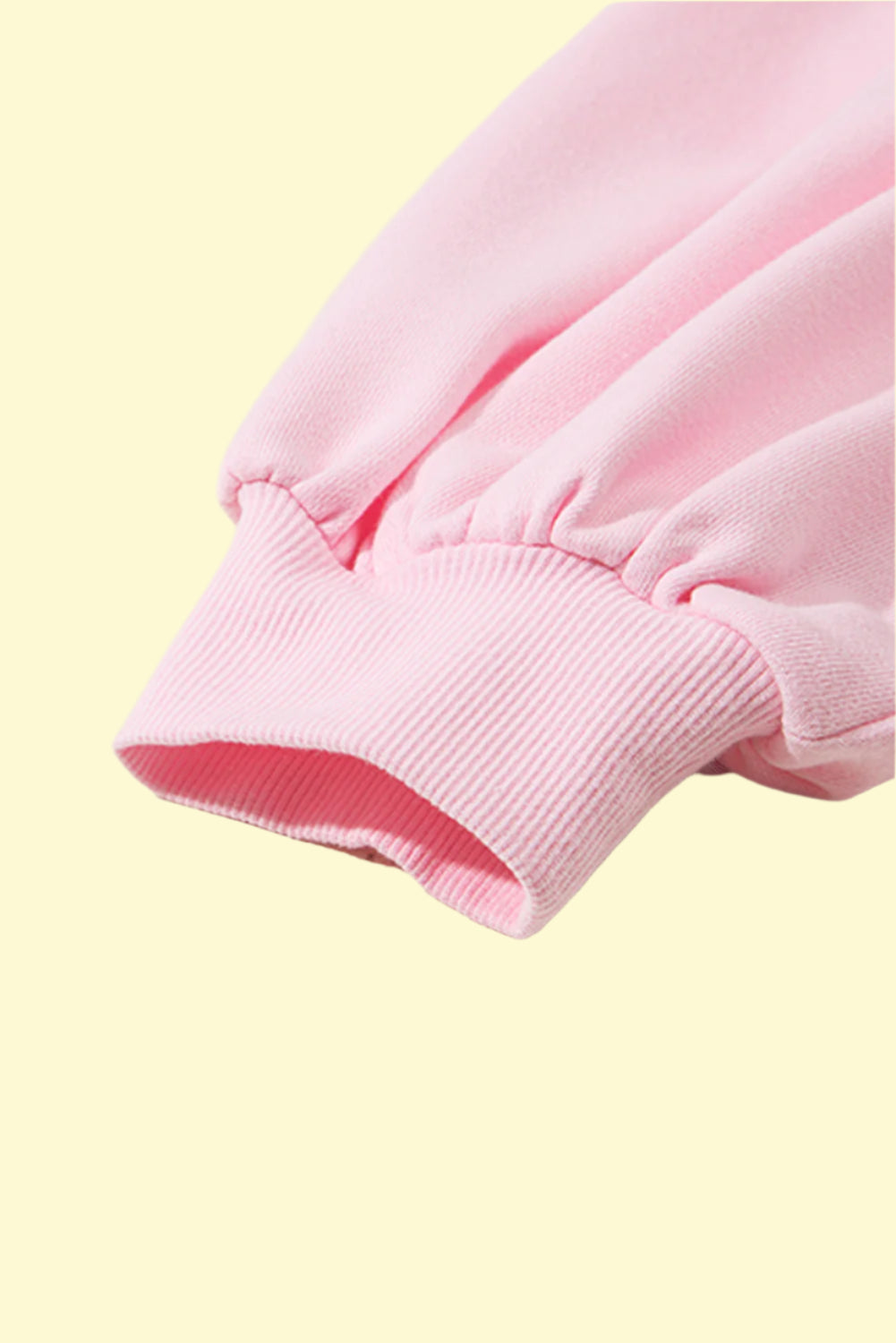 Chic and cozy cuff and bow round neck sweatshirt in blush pink