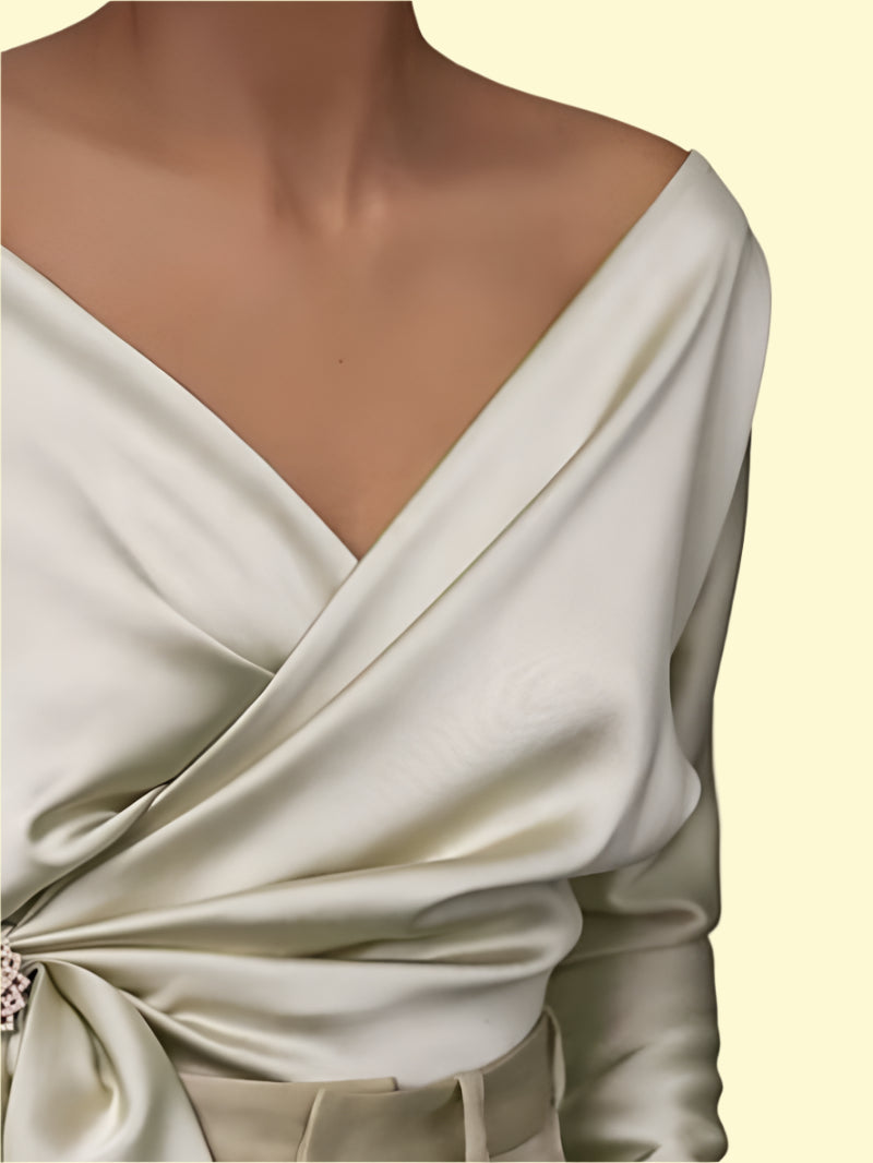 Chic cream blouse with bow-tie detail