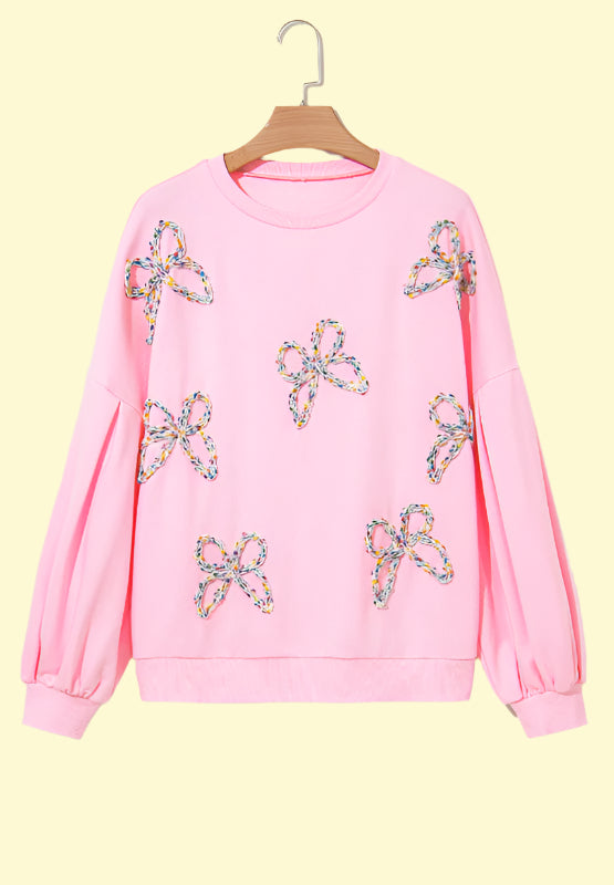 Elegant blush pink sweatshirt for women with bow detail