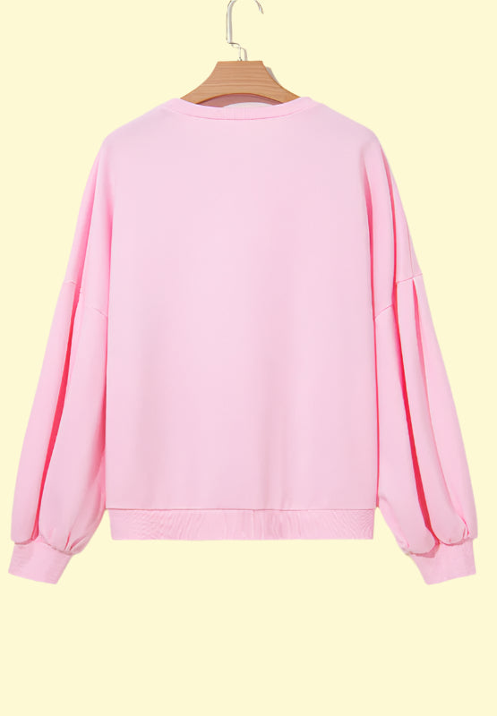 Elegant casual sweatshirt in blush pink with bow neck