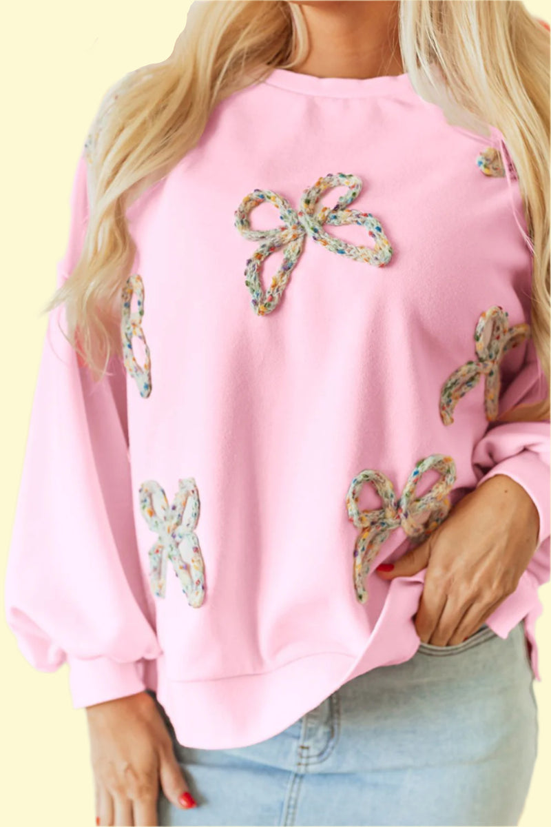 Feminine long sleeve sweatshirt with bow neck detail in blush pink