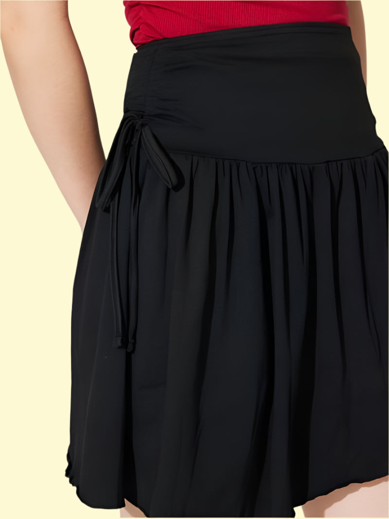 Opaque black mini skirt with asymmetric hem