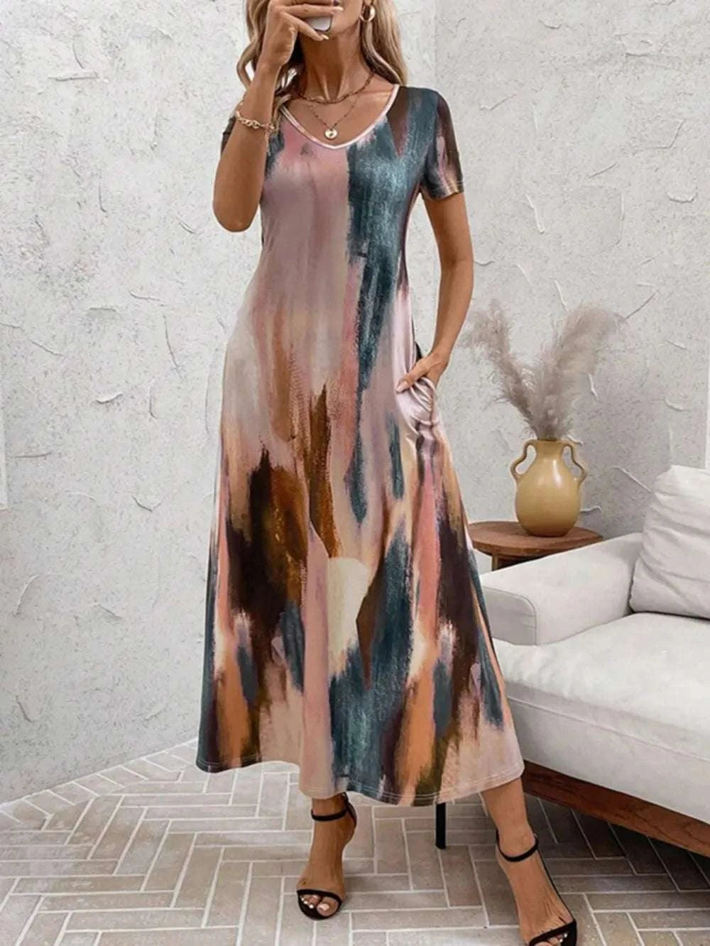 Pocket detail on women’s tie-dye midi dress