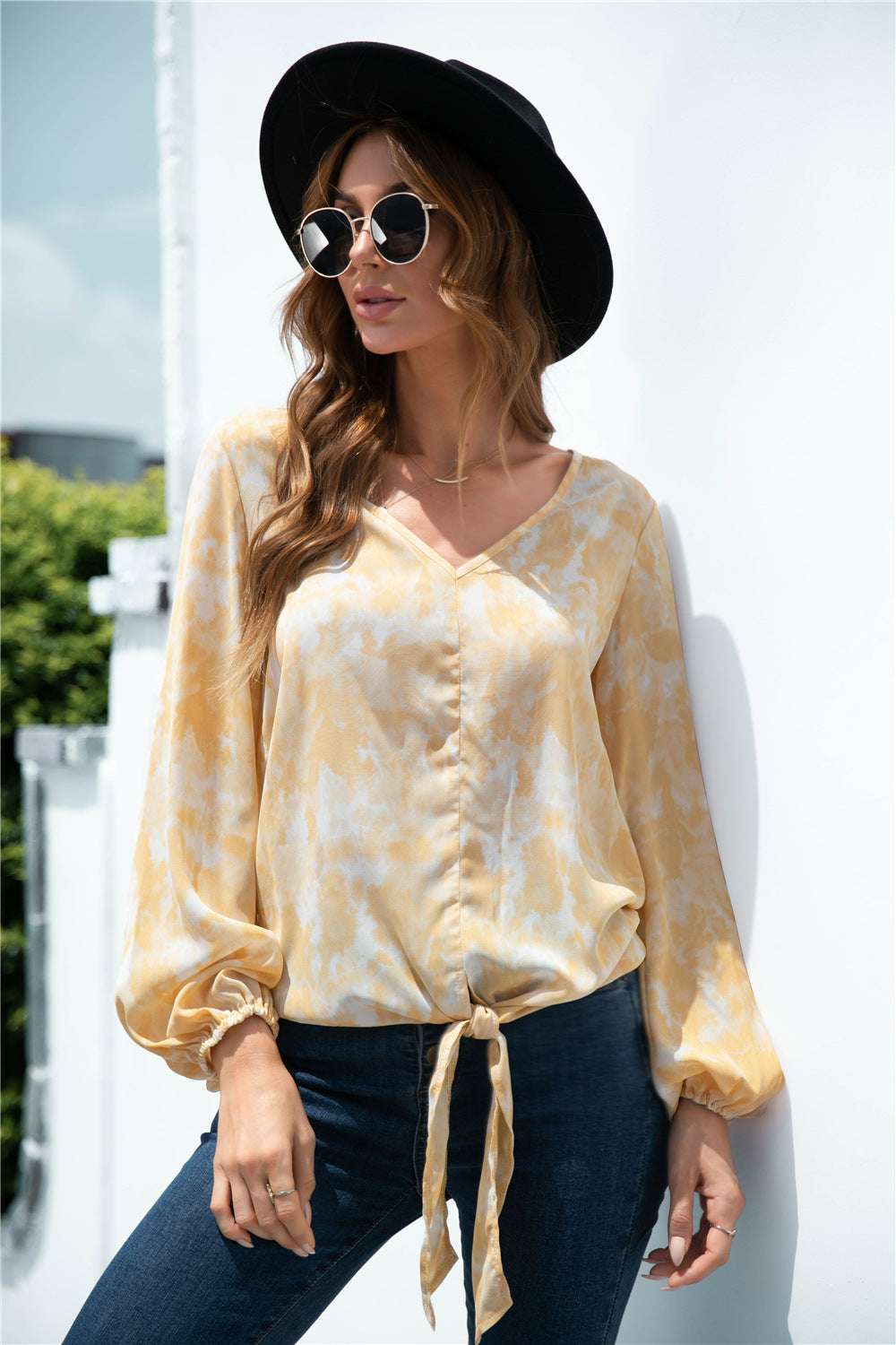 Trendy women top with balloon sleeves and V neck