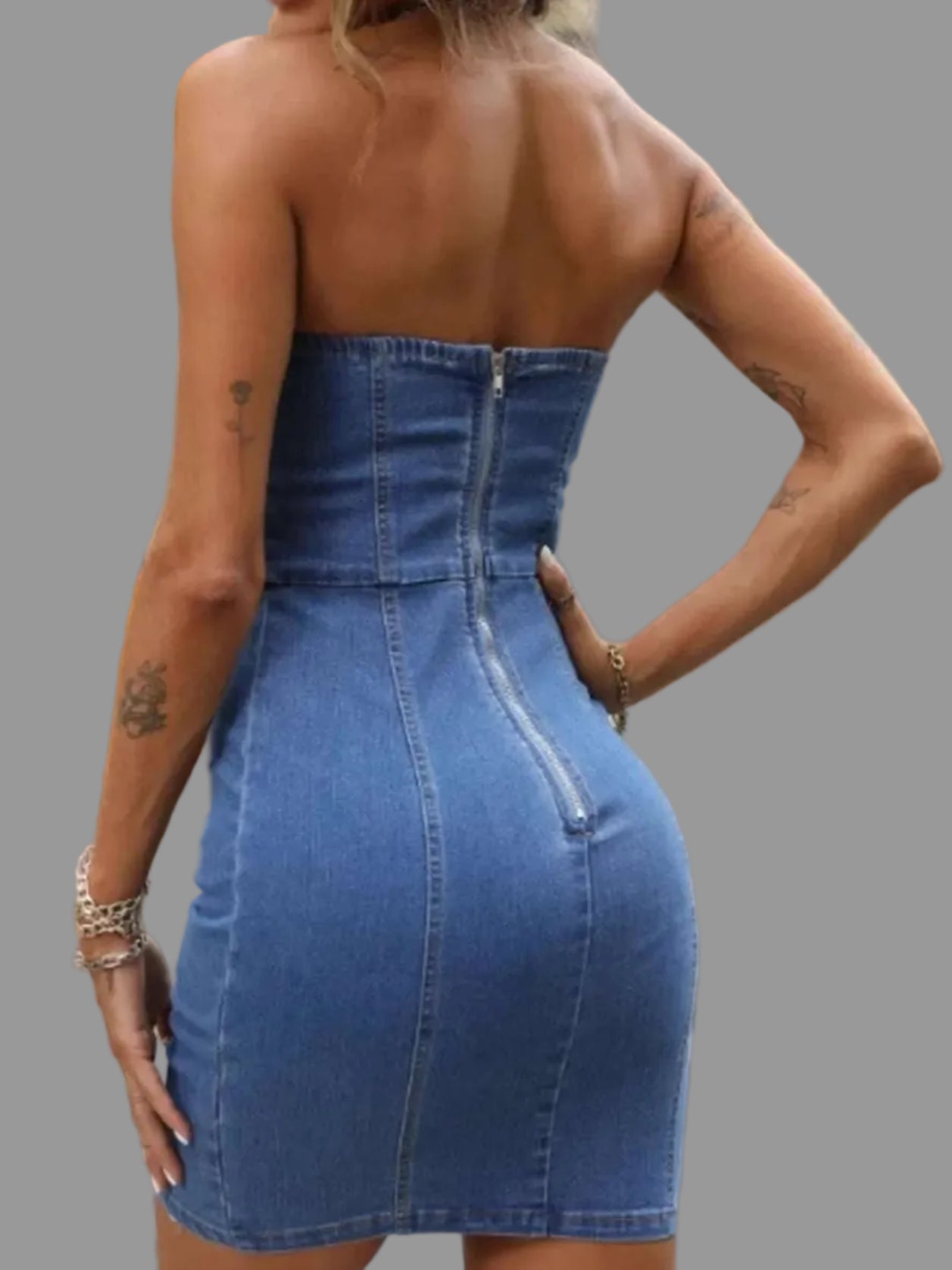 Back view of blue denim dress with zipper closure