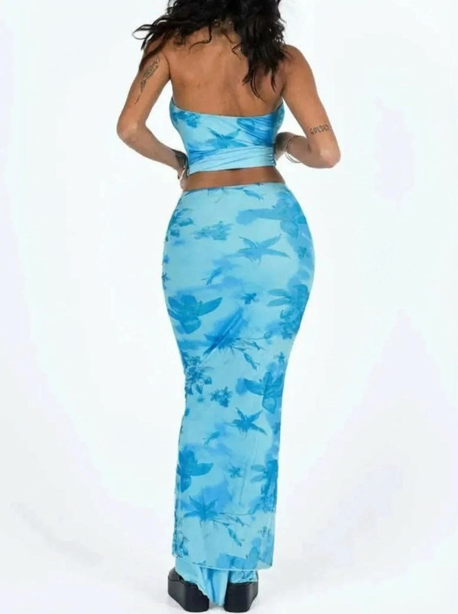 Back view of women’s printed maxi skirt and tube top set