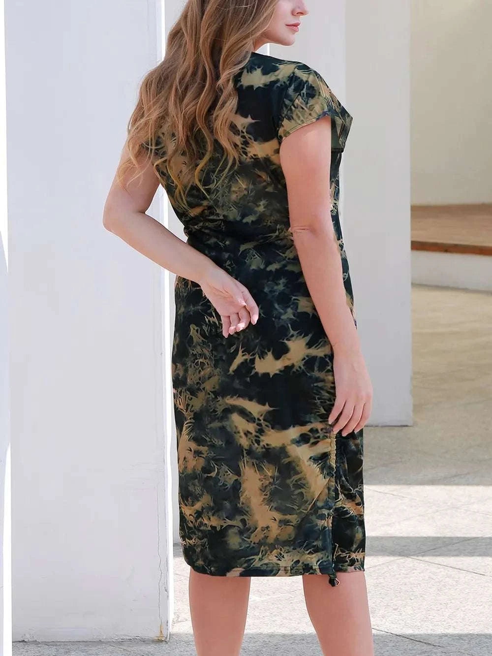 Back view of black tie-dye plus size women dress
