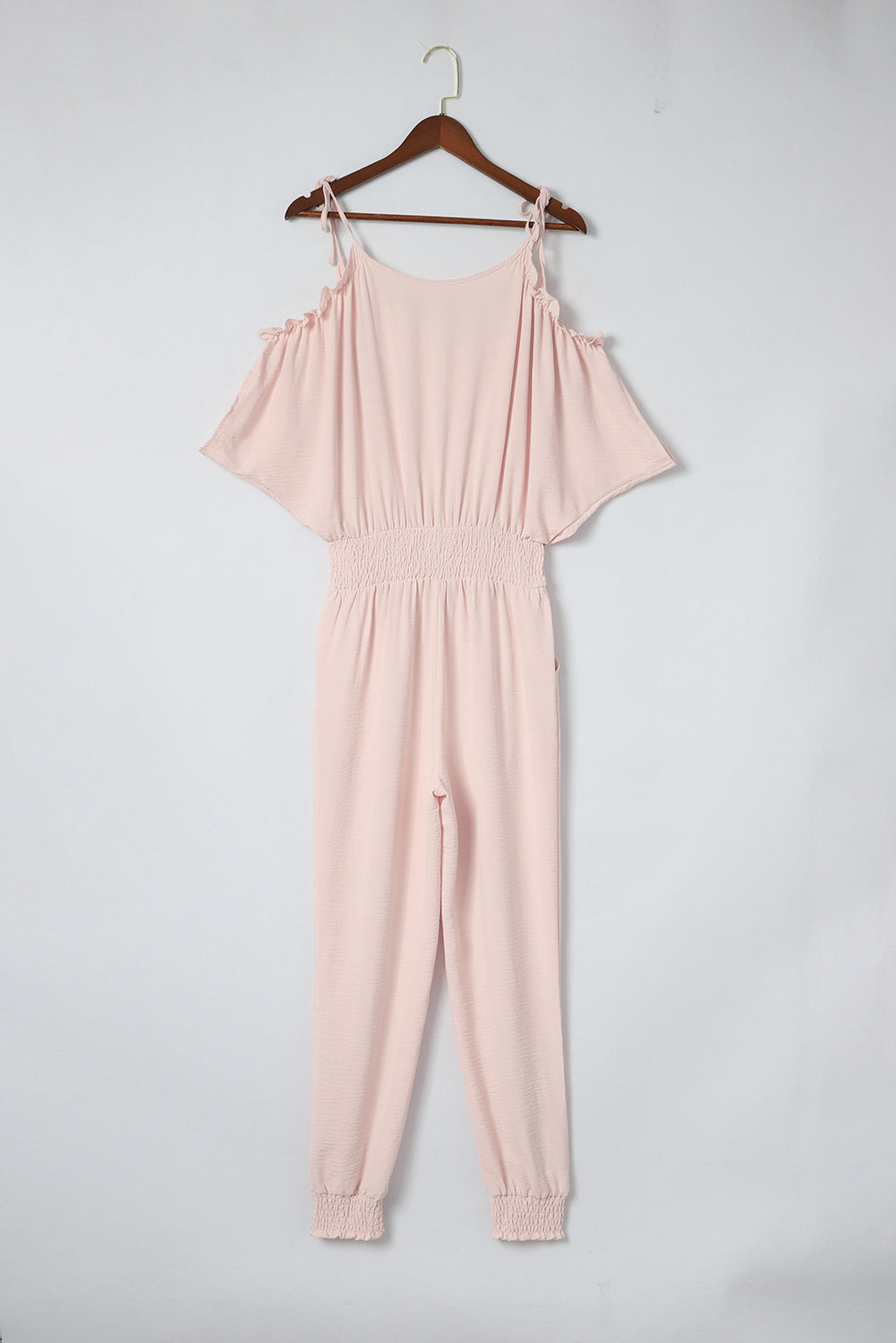 Back view of frill cold shoulder jumpsuit for women