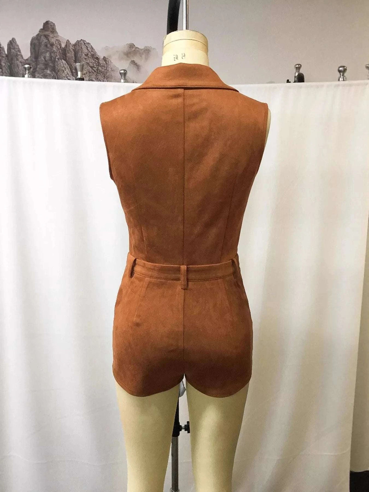 Back view of sleeveless brown romper for women