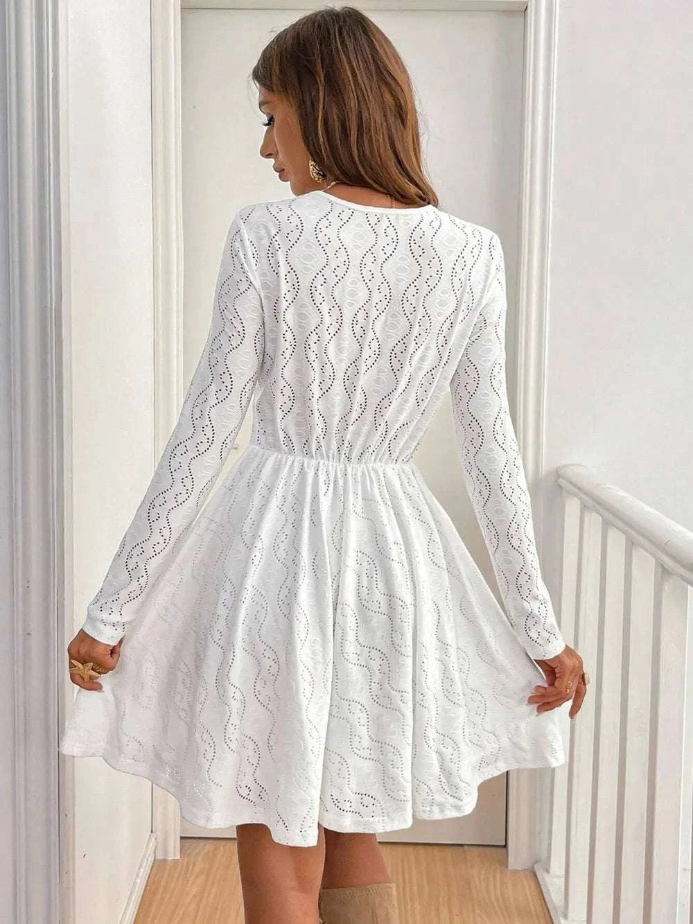 Back view of white lace mini dress for women