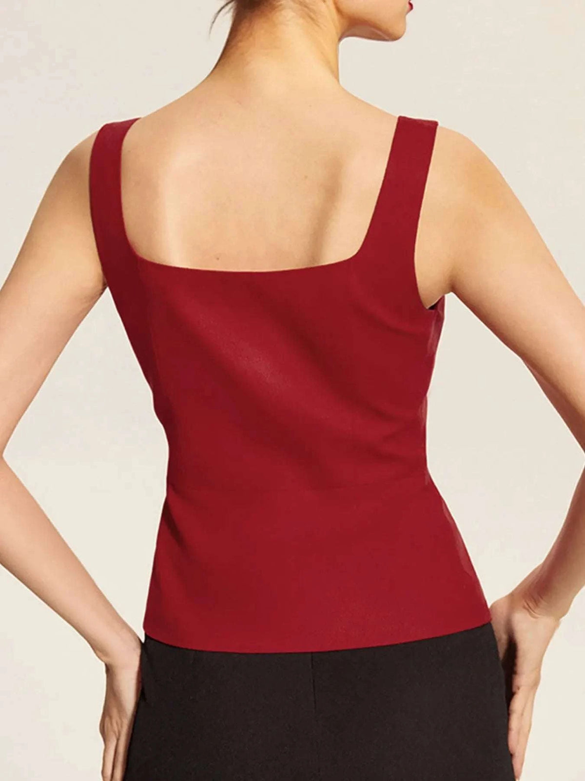 Back view of women’s burgundy two piece outfit