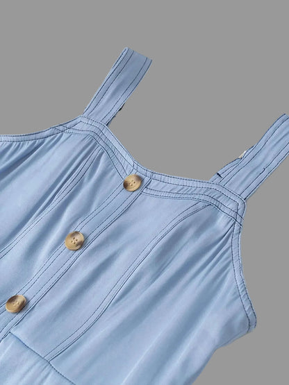 Close-up fabric texture of light blue denim dress