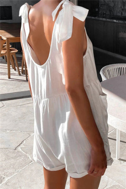 Close-up of bow detail on women’s tie shoulder romper