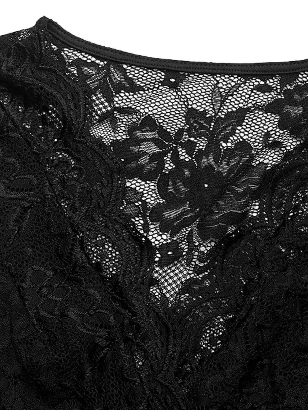 Close-up of lace fabric on black women bodysuit