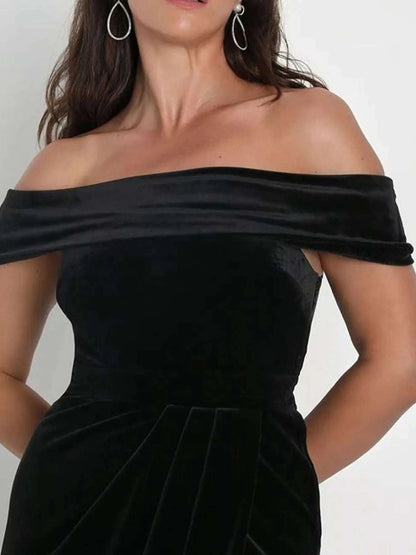 Close-up of off shoulder neckline on women’s wrap dress