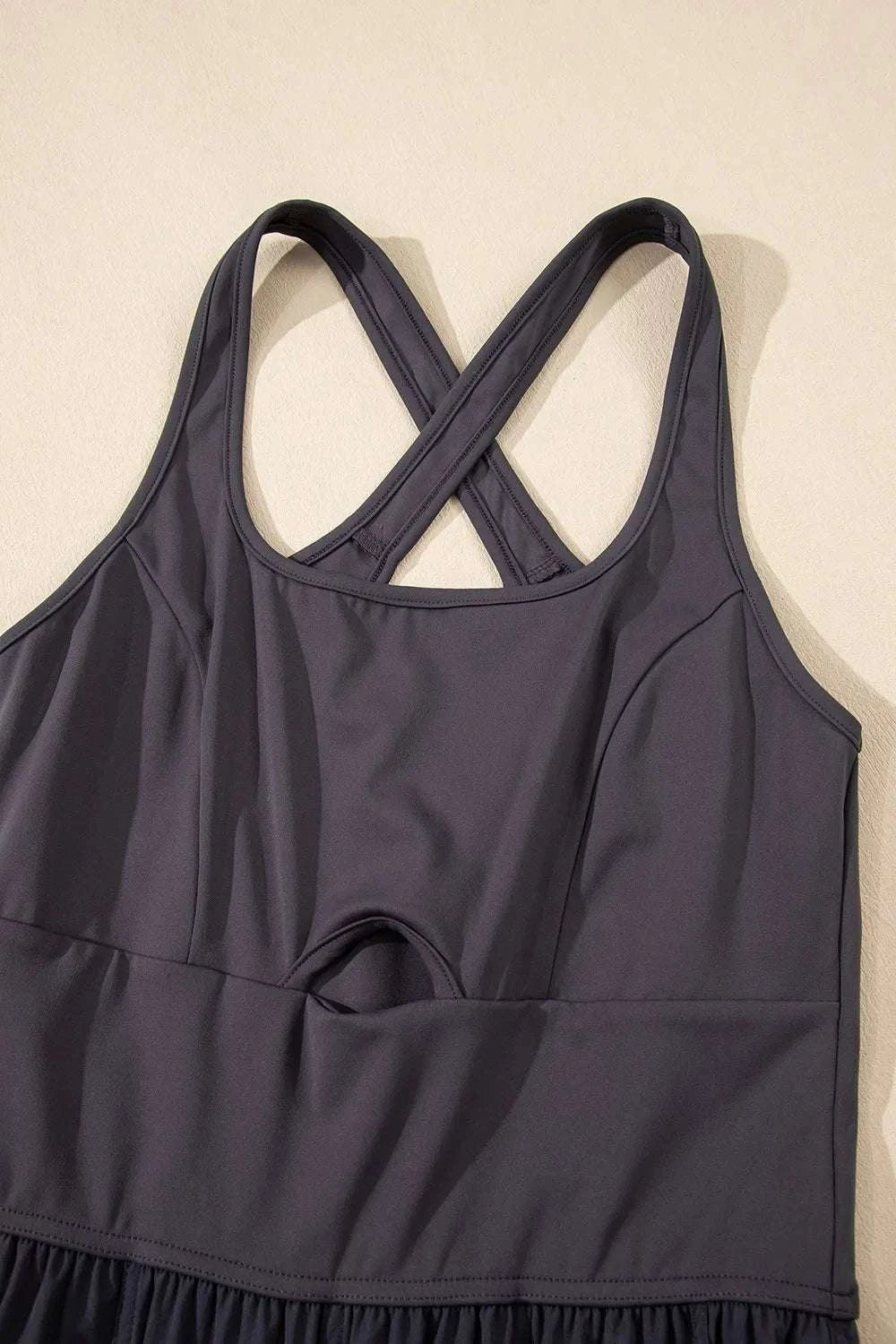 Crisscross cutout detail on dark gray jumpsuit for women