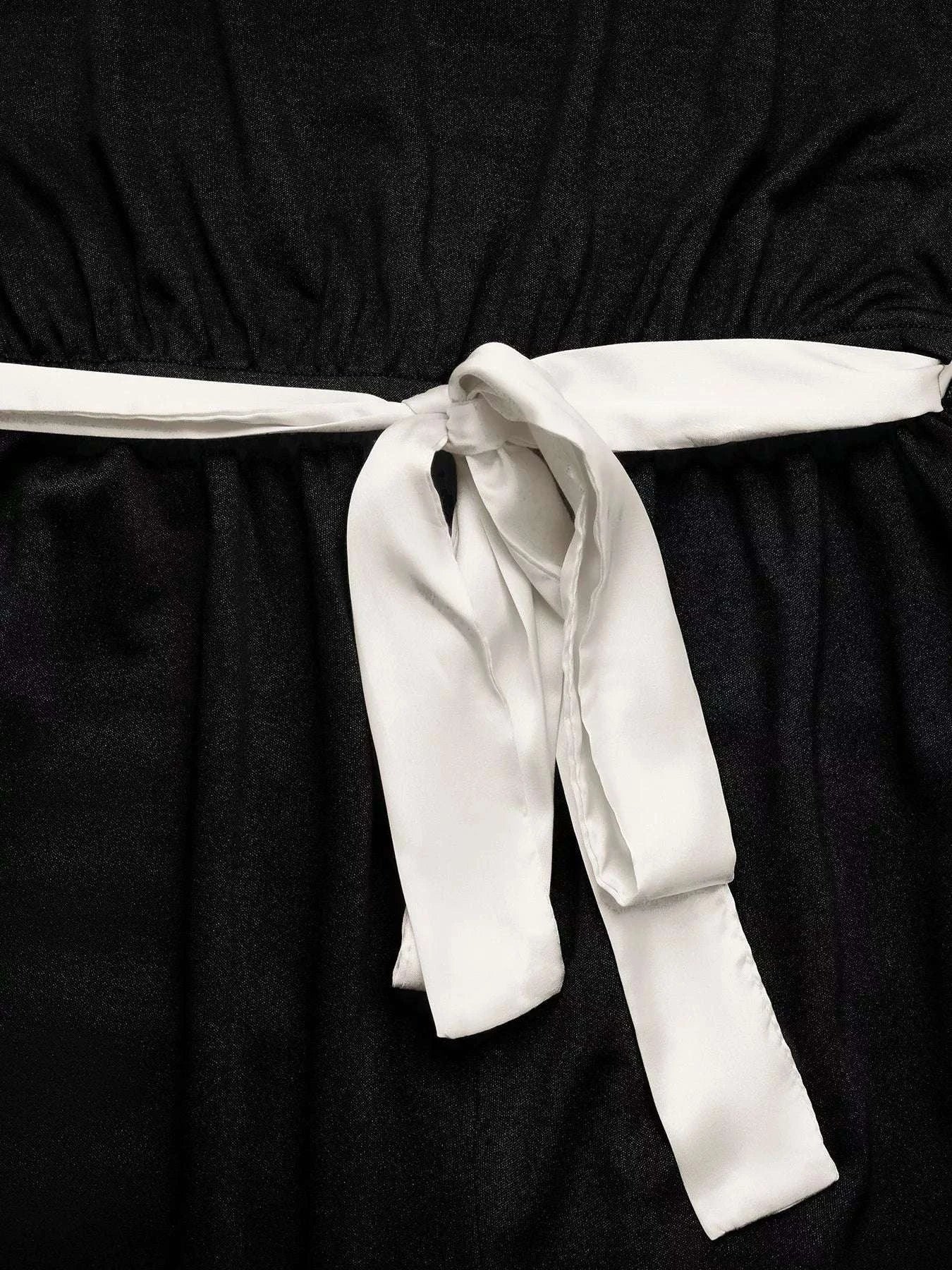 Detail of stretch fabric on women’s wide leg jumpsuit