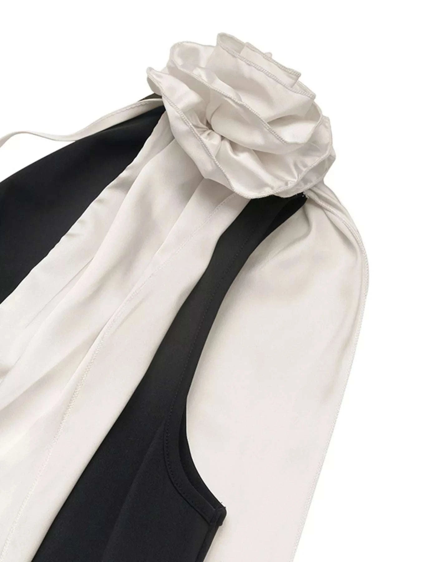 Detail view of floral applique on women’s maxi dress