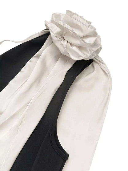 Detail view of floral applique on women’s maxi dress