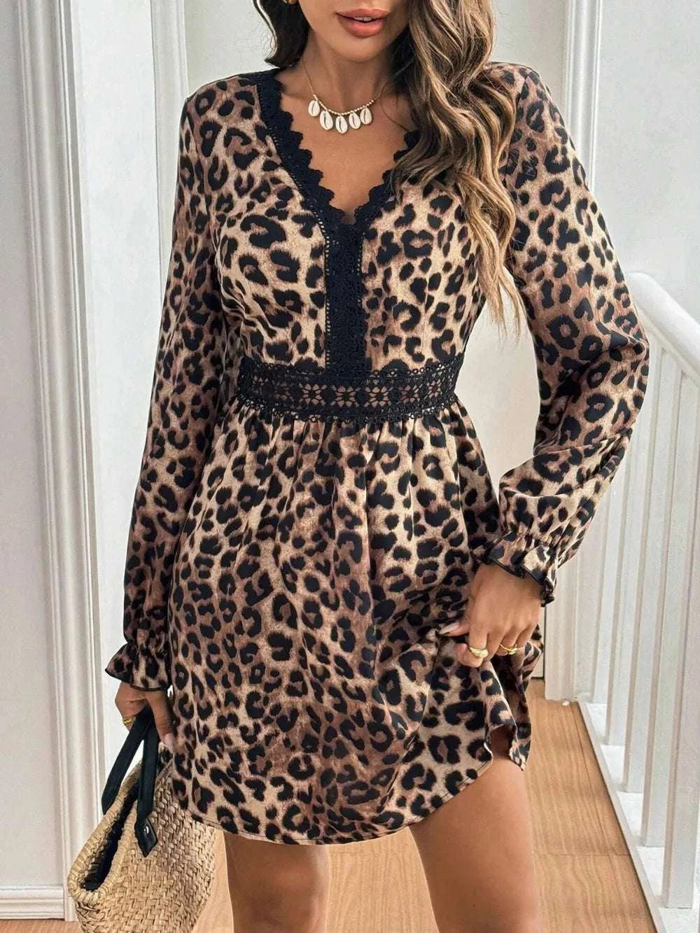 Fabric texture of leopard print women’s dress