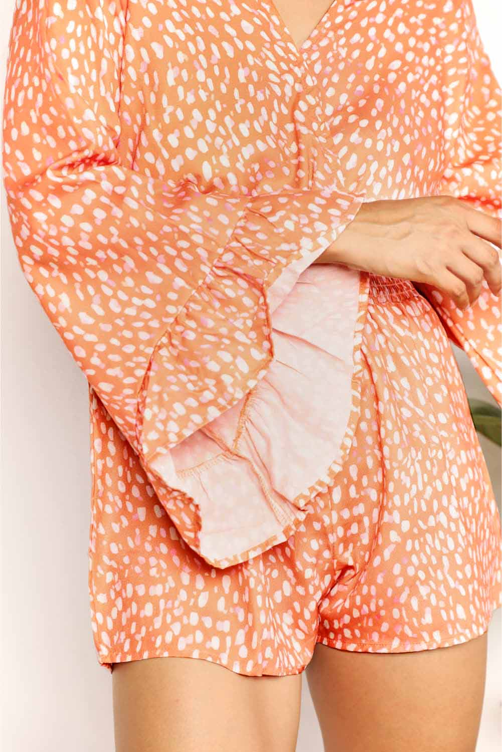 Flare sleeve detail on chic printed romper for women