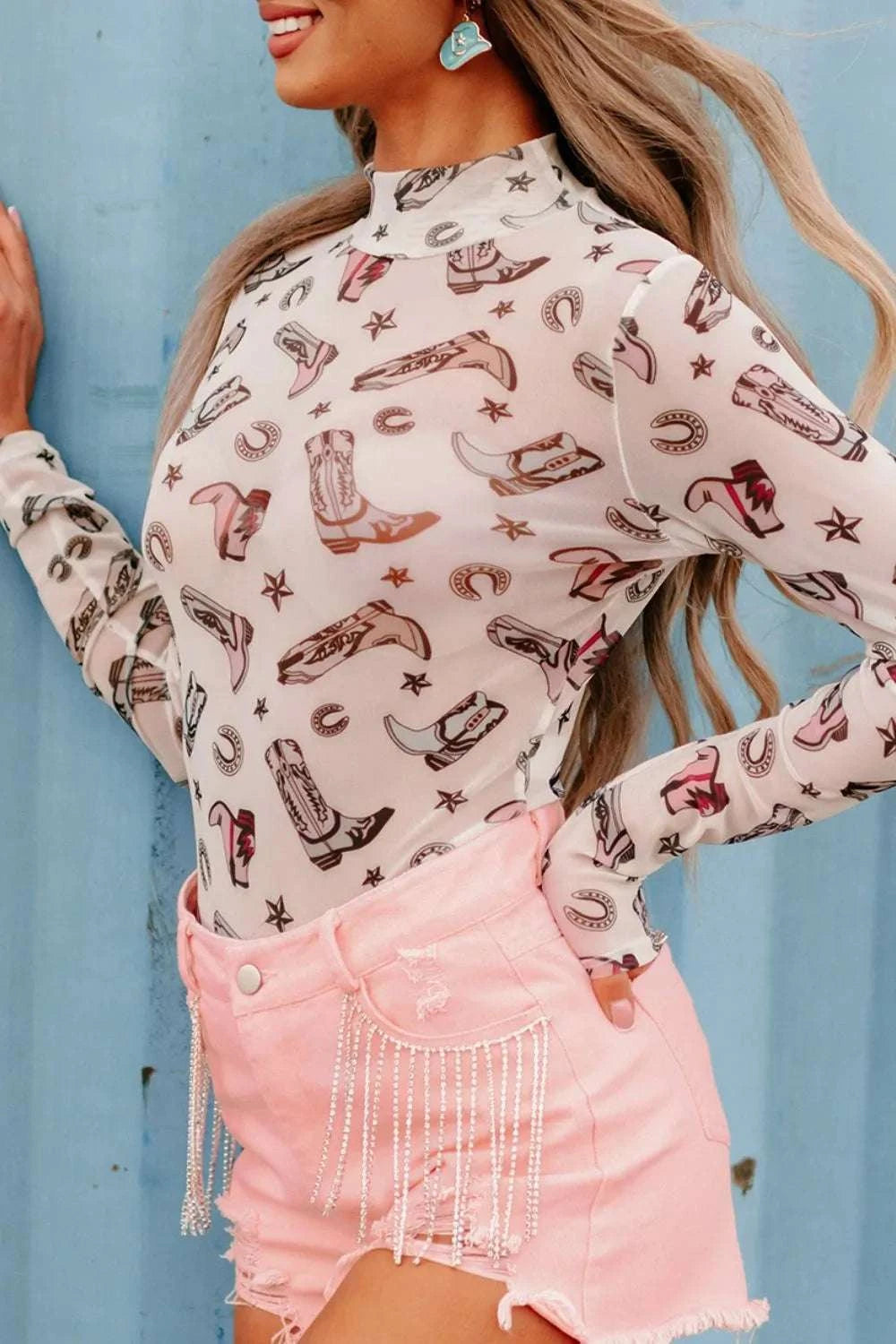 Mock neck neckline detail on women’s printed bodysuit