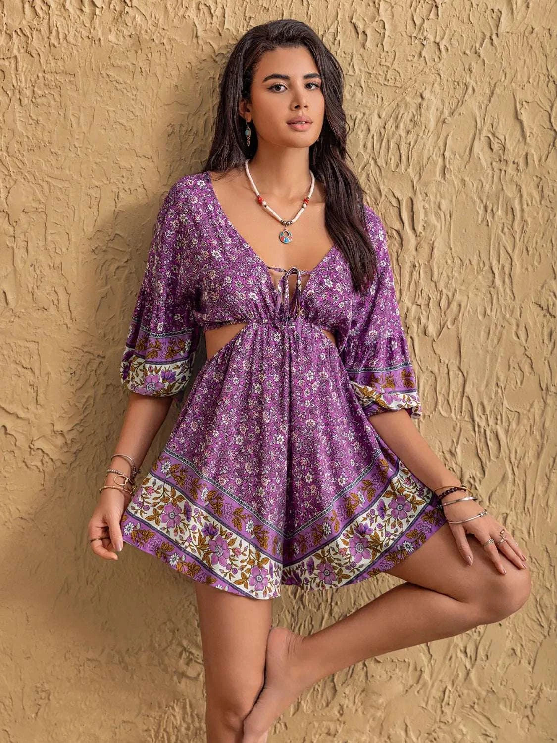 Purple printed cutout romper for women by WestCloset front view