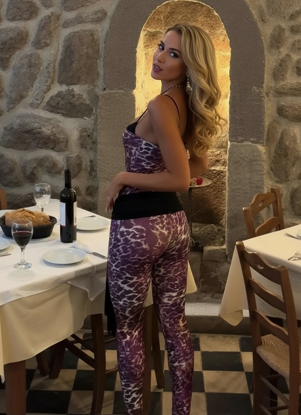 Side view of women’s leopard print jumpsuit outfit