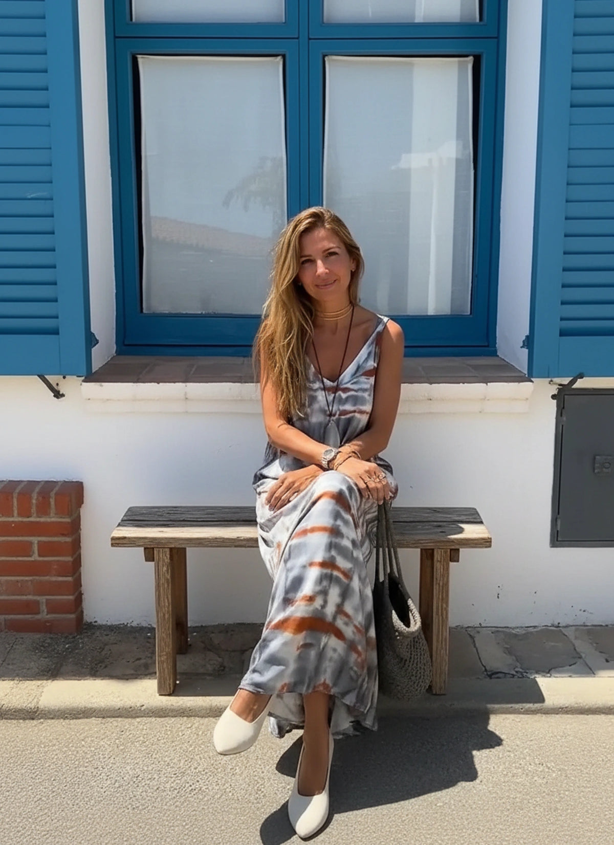 V-neck cami neckline detail on women’s floral maxi dress