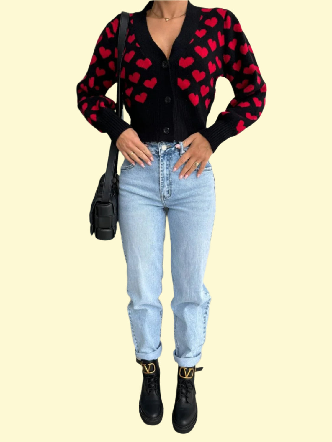 Valentine’s Day outfit idea: black cropped heart cardigan