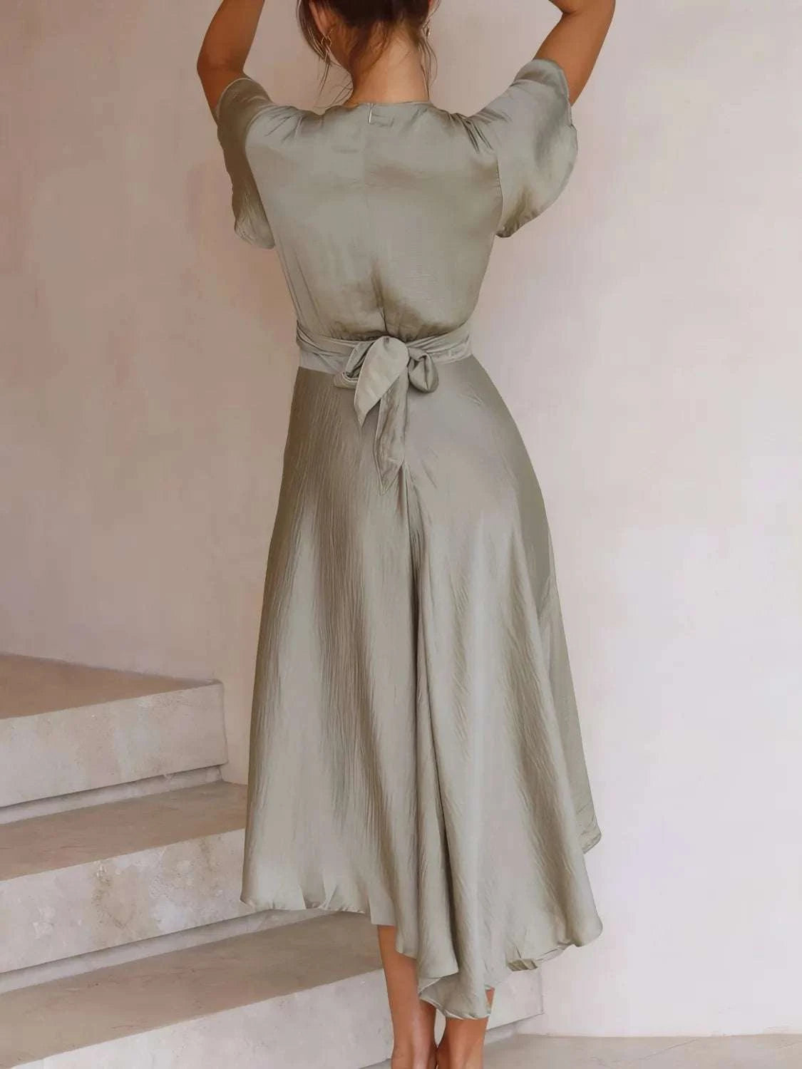 Women’s high-low tied party dress back view