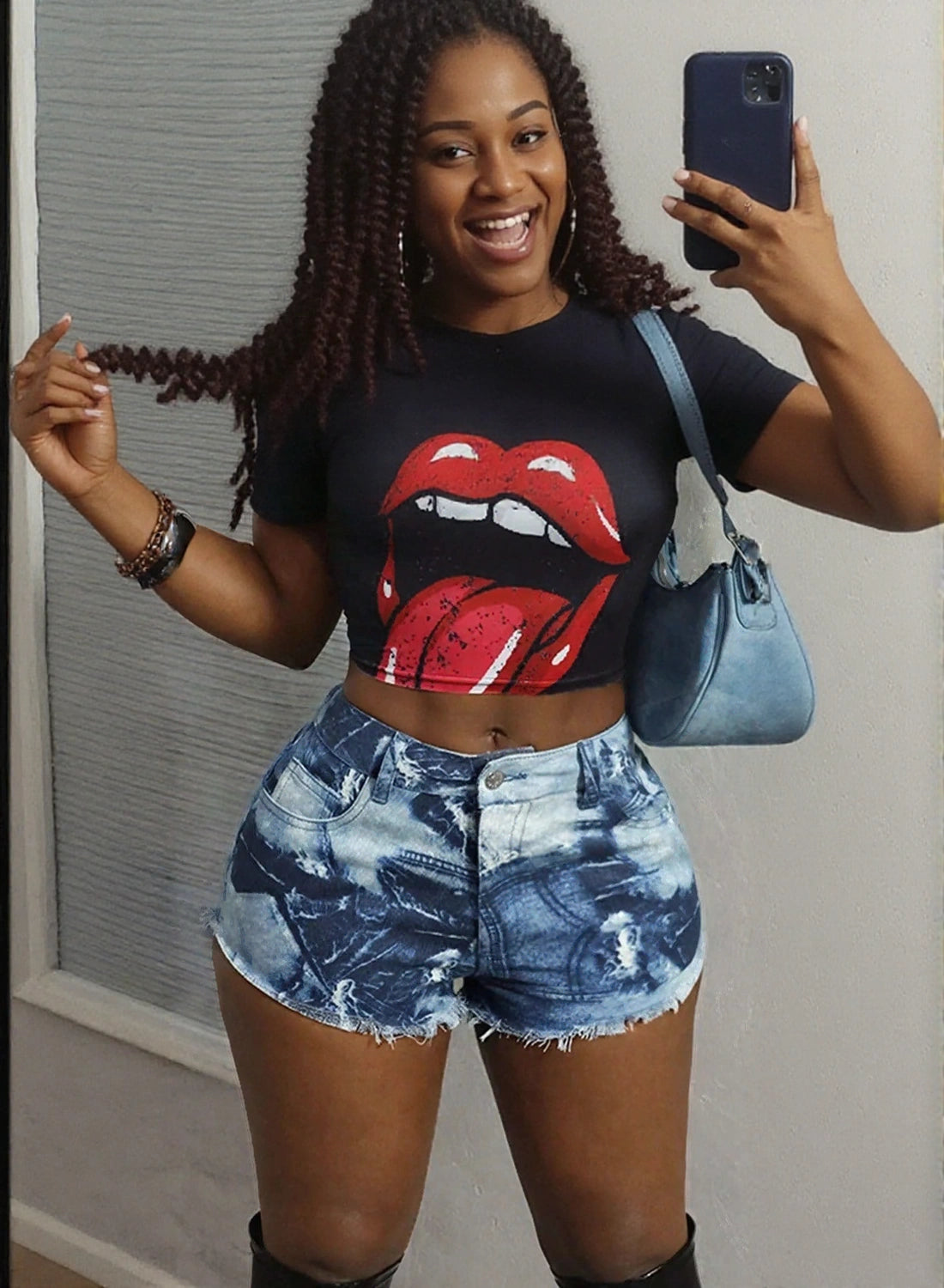 Women’s raw hem denim shorts in blue by WestCloset