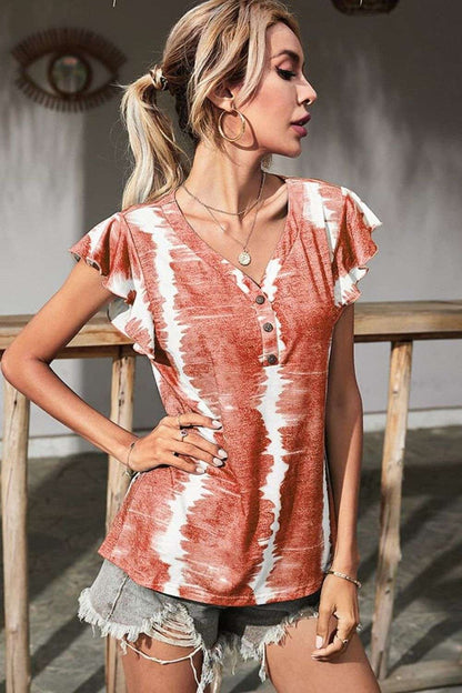 Women wearing tie-dye blouse with butterfly sleeves