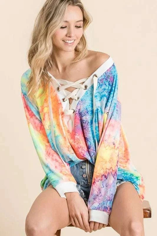 Women wearing tie dye deep V-neck top for casual outings