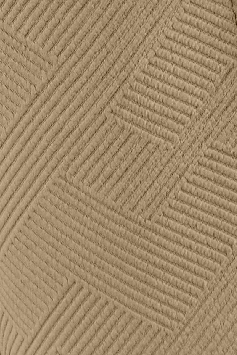 Close-up of the soft, slouchy fabric of the set