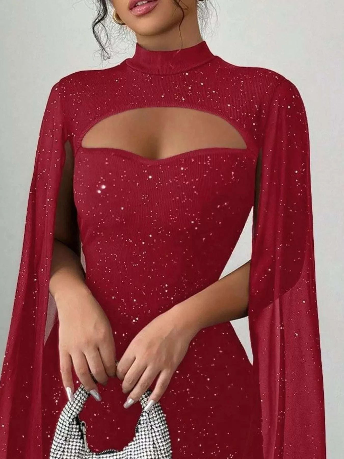 Close-up glitter fabric detail on women mini dress