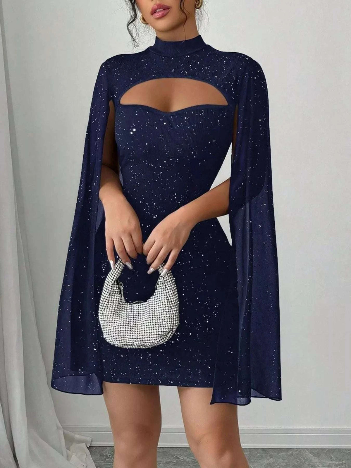 Navy glitter mini dress with cape sleeves evening look